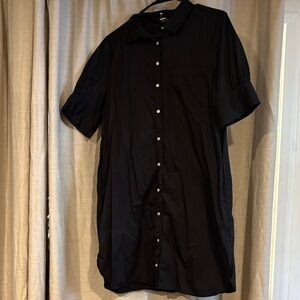 Woman’s black button up dress